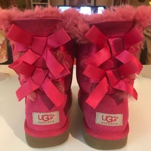 Ugg’s Kids pink bailey bows size 2 boots.